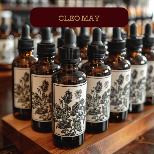 rows of amber dropper bottles with Cleo May Oil